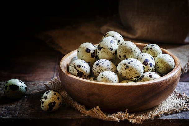 Quail eggs, old wooden background - Φωτογραφία, εικόνα