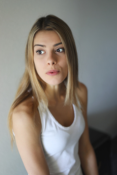 Head Shot of a Beautiful Blond Woman with Brown Eyes - Foto, imagen