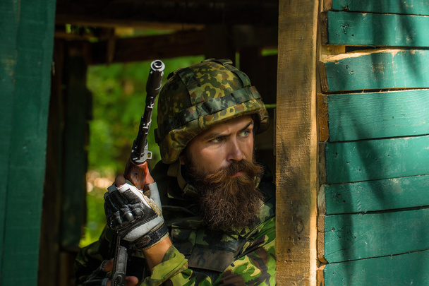 Portrait of soldier in camouflage - Фото, зображення