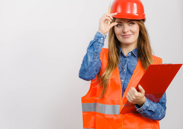 Woman engineer construction builder in helmet. - Foto, Imagem