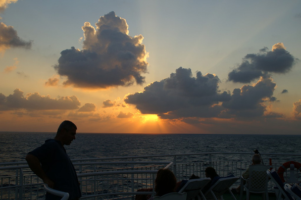 Pôr do sol em um mar
 - Foto, Imagem