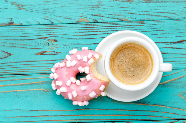 Donuts on colorful wooden background - Photo, Image