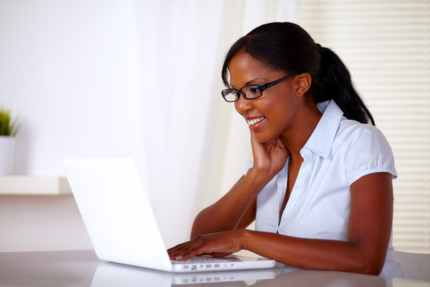 Attractive woman working on laptop - Fotó, kép