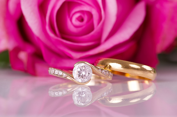 Rings and rose. - Photo, Image
