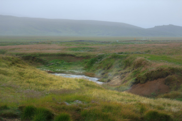 Kuuma virta geotermisellä alueella Islannissa
 - Valokuva, kuva