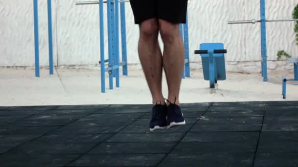 Jumps on a skipping rope. Slow motion - Imágenes, Vídeo