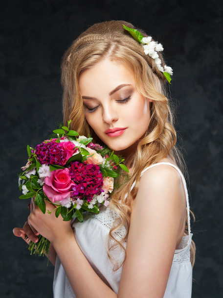 beautiful blonde girl in a wreath of flowers - Photo, Image