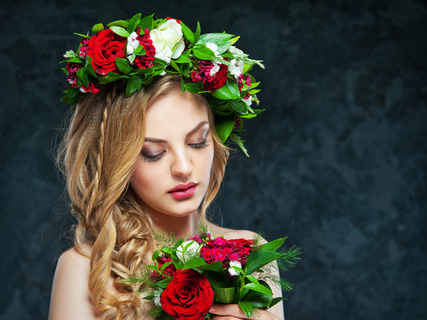 beautiful blonde girl in a wreath of flowers - Photo, Image