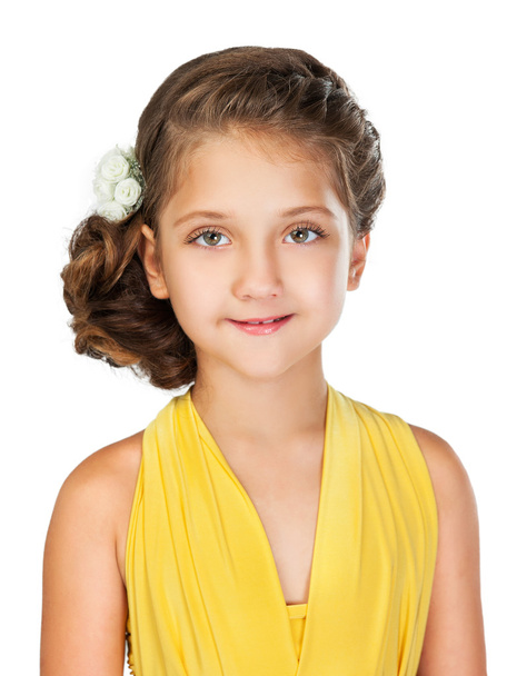 portrait of a little girl in a yellow dress - Фото, изображение