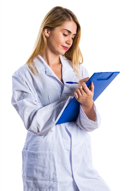 Doctor woman holding notes - Foto, afbeelding