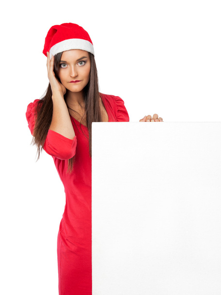 fille tenant une grande liste de choses à faire pour Noël
 - Photo, image