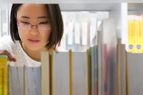 Asian Girl Reading Searching Books Library White Modern Cute Gla - Foto, imagen