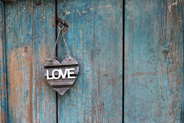 Rustic Love sign on an old blue weathered door - Photo, Image