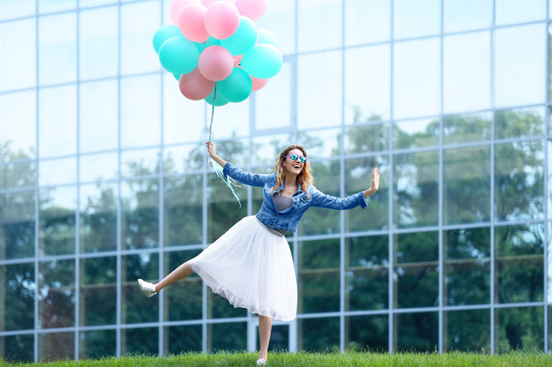 woman with colorful balloons  - Foto, Bild