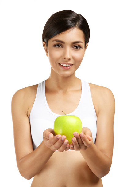Beautiful girl with apple, isolated on white - Foto, imagen