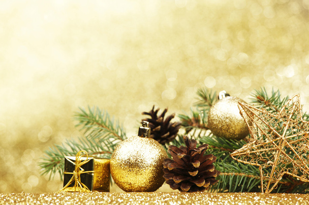 Christmas card with fir and decor on glitter background - Fotografie, Obrázek