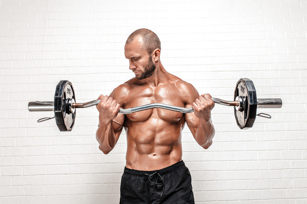 Strong man with weight bar - Foto, Imagem