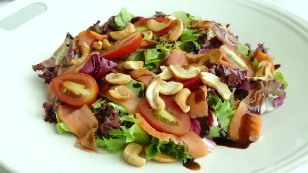 Salad with meet, lettuce and cashew nuts - Footage, Video
