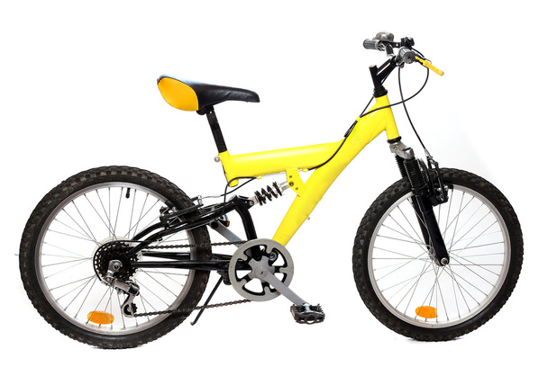 Bicicleta de montaña amarilla sobre fondo blanco
. - Foto, Imagen