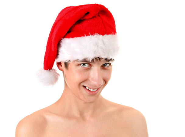 jonge man in Kerstman hoed - Foto, afbeelding