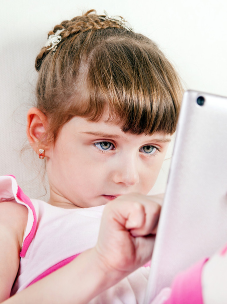Small Girl with a Tablet - Фото, зображення