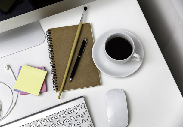 office desk with stationaries and coffee cup - Photo, Image