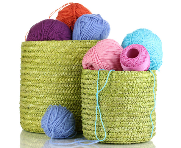 Colorful yarn for knitting in green basket isolated on white - Photo, Image