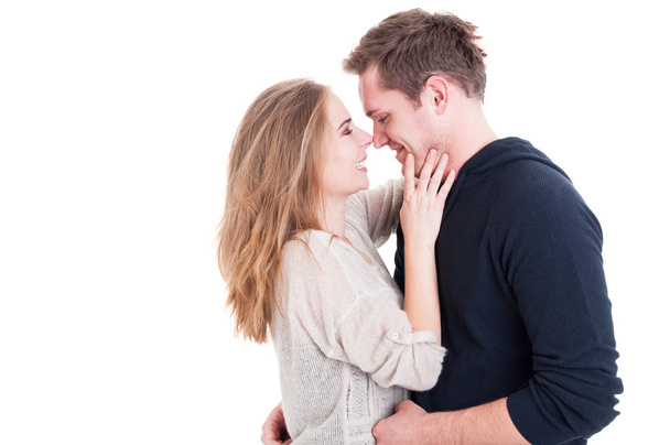 Attractive couple being affective and looking happy - Photo, Image