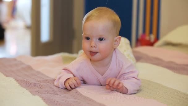 Baby on a bed in the bedroom - Footage, Video