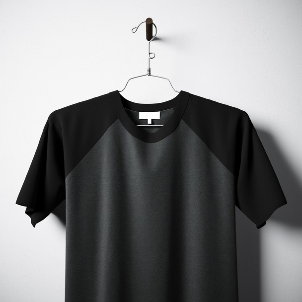 Closeup of blank cotton tshirt black and gray colors hanging in center empty concrete wall. Clear label mockup with highly detailed textured materials. Square. Front side view. 3D rendering. - Foto, Bild