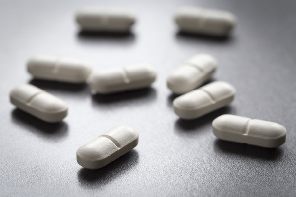 Schmerzmittel, Medikamente in Tablettenform - Foto, Bild