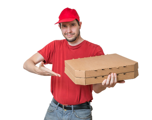 Pizza-Lieferkonzept. Ein kleiner lächelnder Junge hält Kisten mit Pizza in den Händen. isoliert auf weißem Hintergrund. - Foto, Bild