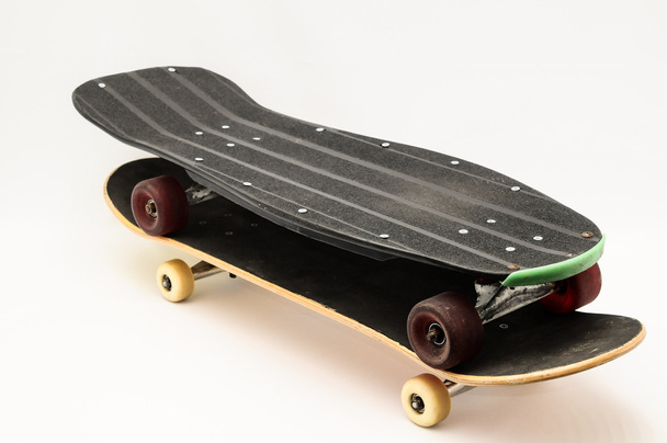 Vintage Style Black Skateboard on a white Background - Photo, Image