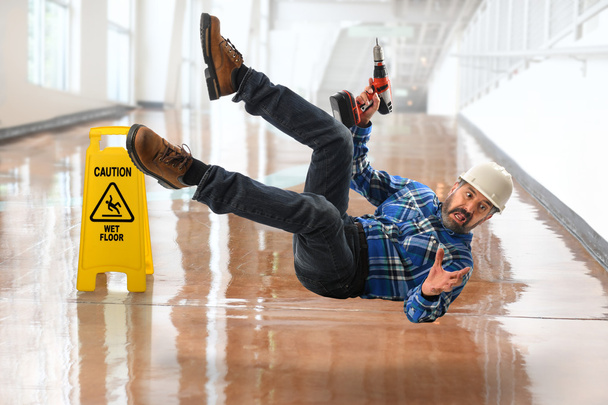 Hispanic Worker Falling on Wet Floor - Fotografie, Obrázek