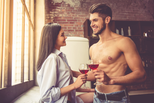 Sexy young couple in kitchen - Foto, Imagem