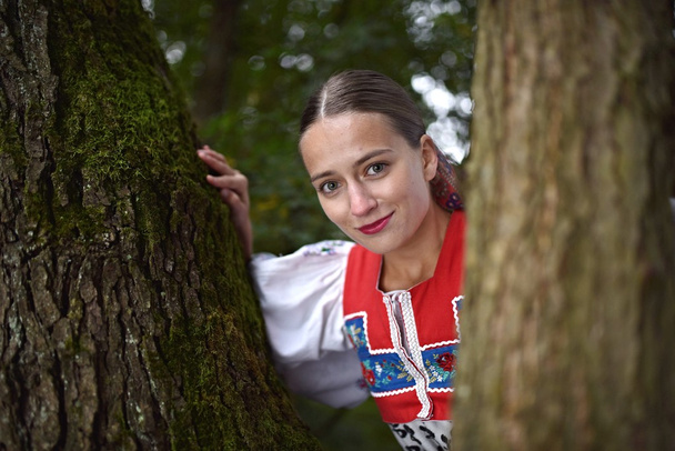 Slovak folklore. Slovakian folklore girl. - Фото, изображение