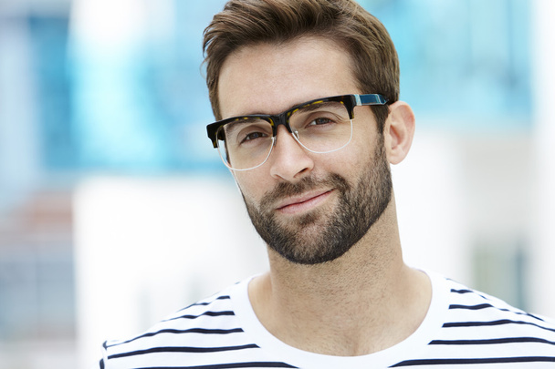 Man with stubble wearing spectacles - Foto, afbeelding
