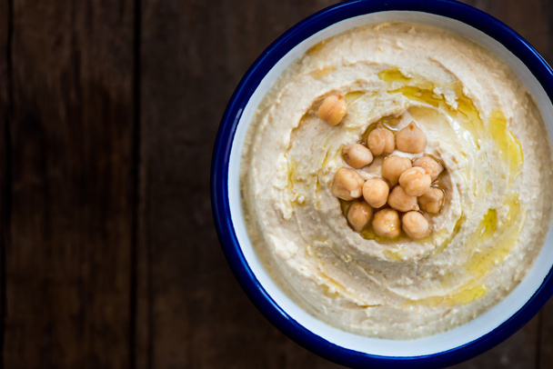 Klassieke Hummus gemaakt van kikkererwten - Foto, afbeelding