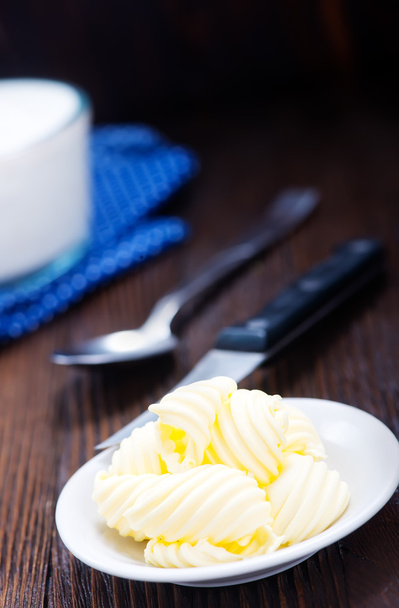 butter on white plate - 写真・画像
