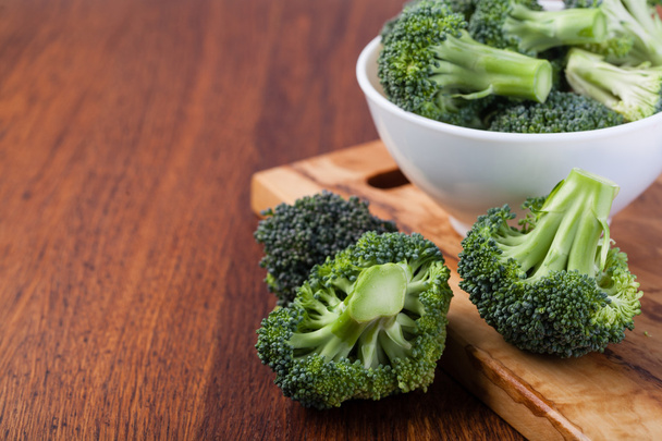 fresh broccoli on a wooden table - Photo, Image