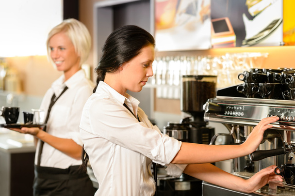 Staff at cafe making coffee espresso machine - Foto, Bild