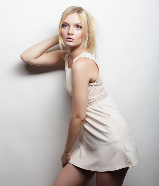 young magnificent woman in white dress. - Foto, Bild