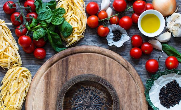 Italian food cooking ingredients for tomato pasta - Photo, Image