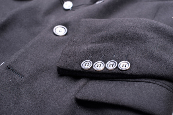 special buttons on the black coat - Photo, Image