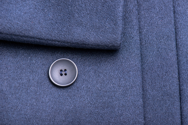 special buttons on the dark blue coat - Φωτογραφία, εικόνα