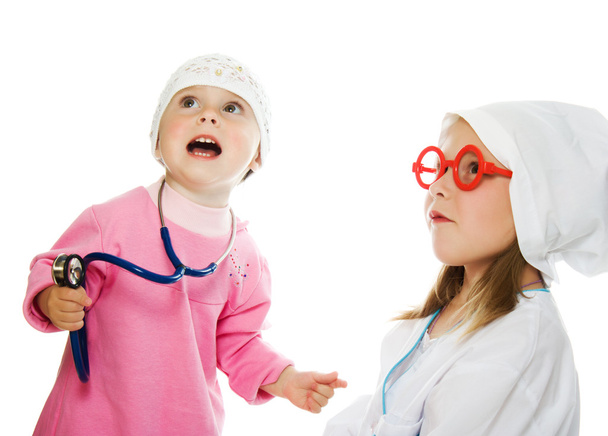 merry children playing as doctor and patient - Foto, Imagem