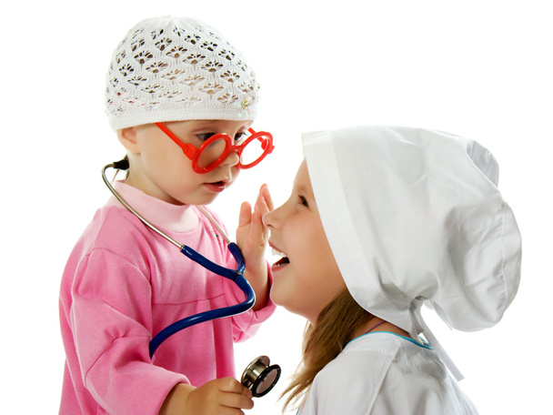 merry children playing as doctor and patient - Foto, immagini