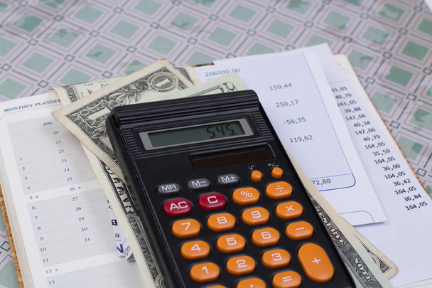 Nástroj nebo hypoteční účty, Kalkulačka a nás dolary - koncepce financí - Fotografie, Obrázek
