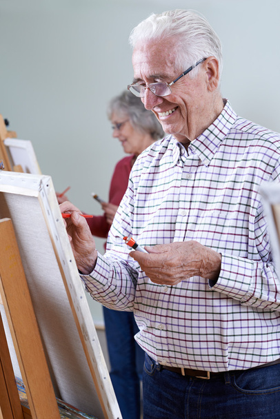 Seniors Attending Painting Class Together - Foto, imagen