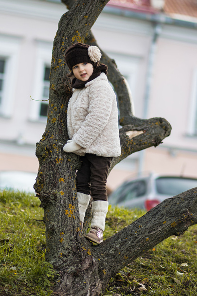Little fashionable girl in warm clothes - Foto, immagini
